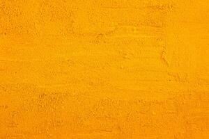 Vibrant Turmeric Powder, A Captivating Background for Culinary and Wellness Concepts photo