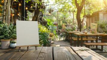 Blank dinner invitation mockup on restaurant table in garden. Empty white menu card in outdoor dining setting. Copy space. Concept of menu mockup, invitation design, table presentation, summer. photo
