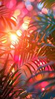 Bright summer tropical botanical background with colorful palm leaves and bokeh effects. Trendy wallpaper with vibrant colors. Copy space. Mockup for design. Vertical photo