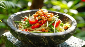 Fresh green papaya salad in bowl garnished with roasted peanuts. Som Tum with cherry tomatoes and green beans. Concept of Thai cuisine, Asian traditional dish, culinary photo