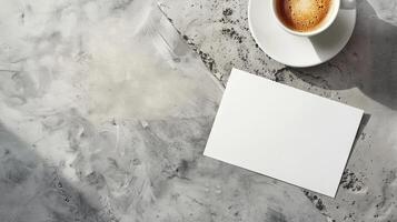 Textured table with coffee cup and blank white paper for text. Minimalist setup with drink and space for writing. Mockup. Banner. Copy space. Concept of work, idea generation, modern design. Top view. photo