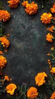Orange marigolds flowers arranged on dark background. Copy space. Concept of floral arrangement, nature beauty, botanical design. Day of the Dead, Dia de los Muertos. Greeting card. Vertical photo