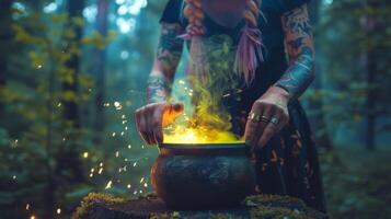 Tattooed woman making a magical potion in the forest. A witch brews a elixir in a cauldron. Concept of mystery, witchcraft, alchemy, nature magic photo