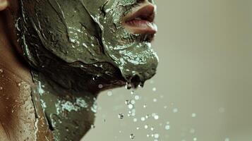 Portrait of a man with Green Face Mask Dripping photo