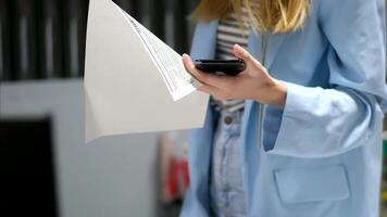 Girl phone paper office Writing, phone and notebook with hands, planning or information. Document, project and ideas with girl and journal for proposal, target or financial advisor video