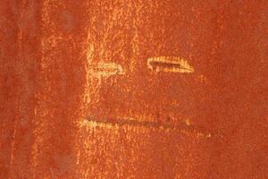 Rust Painted Wall Texture. Face. photo
