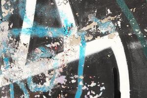 Weathered Graffiti Wall. Urban Street Art Beauty. Texture Backgr photo