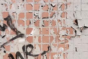 Old Weathered Brown Painted Tiles Wall Texture. Urban Street Bac photo