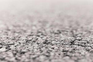 Asphalt Road focused foreground with blurred background. photo