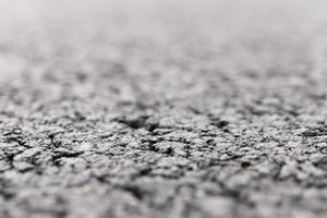 Asphalt Road focused foreground with blurred background. photo