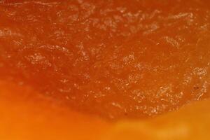 Fresh Dried Apricot Texture. Warm Nature Organic Background. Macro Closeup. photo