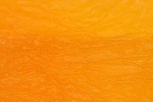 Dried Yellow Apricot Texture. Warm Nature Organic Background. Macro Closeup. photo
