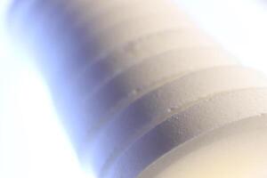 Medicine Tablets Stack. Big White Pharmacy Pills on Isolated Background. Macro Closeup. photo