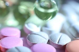 Different Medicine Tablets Stuff. Pharmacy Background. Macro Closeup. photo