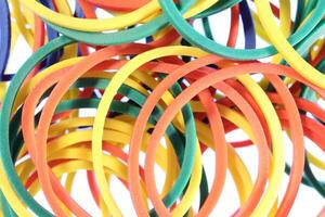 Many Colored Scattered Stationery Rubbers Background. Gums for Money. Business Office Equipment Concept. Macro Closeup. photo