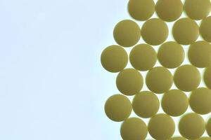 Isolated Pills Texture. Medical Tablets Background with Place for Text. Macro Closeup. photo