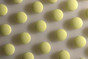 Yellow Isolated Pills Texture. Medical Tablets Background. Macro Closeup. photo
