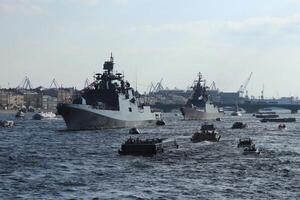 Russian Navy Battleships with passenger boats on Neva River. Day of the Russian Navy. Saint-Petersburg. photo