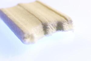 Half of Yellow Bubble Gum. Freshness Gummy Delicious Background. Yummy Backdrop. Macro Closeup. photo