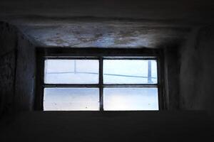 A small window on the way of the staircase to the colonnade of St. Isaac's Cathedral photo