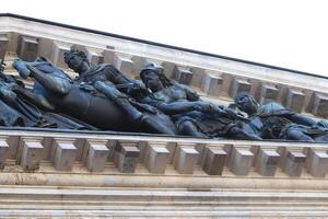 Aspiring figures on the facade of St. Isaac's Cathedral. Saint-Petersburg photo