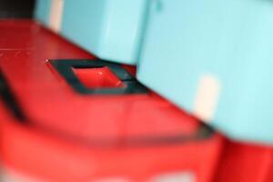Colored Transformer Toy Element. Assembled Plastic Construction Background. Macro Closeup. photo