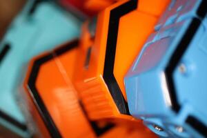 Many Colored Transformer Toys. Assembled Plastic Construction Background. Macro Closeup. photo