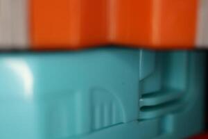 Colored Transformer Toys. Assembled Plastic Construction Background. Macro Closeup. photo