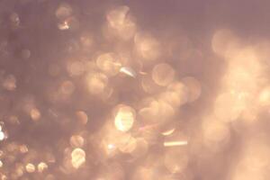 Snow Surface Bokeh Texture. Winter Warm Backdrop. Christmas Glitter Background. photo