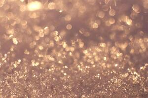 Snow Surface Bokeh Texture. Winter Warm Backdrop. Soft Blurred Christmas Glitter Background. photo
