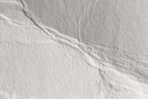 White Paper Texture with Soft Folds. Macro Closeup. photo