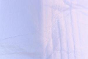 Soft Fold Lines on Light Lilac Paper Texture. Macro Closeup. photo