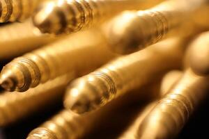 Golden Screws Background. Macro Closeup. Public Relation Promotional Concept. photo
