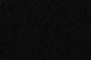 Black Fleecy Material Texture. Dark Detailed Fibers Fluffy Surface Background. photo