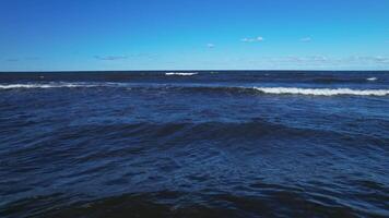 A body of water that has some waves in it video