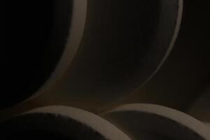 Big Medicine Tablets Stand on Top of Each Other in Dark Background. Macro Closeup. photo