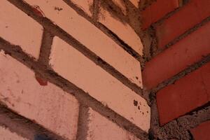 White and Red Bricks Corner with Concrete Grid photo