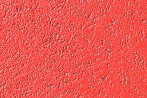 Red painted asphalt texture. Colored road surface background. photo