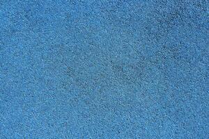 Rubber floor texture. Granules playground cover background. photo