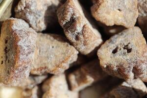 Natural banana candies. Dry banana slices with sugar. photo