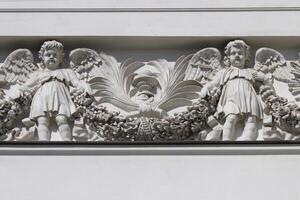 Two angels. Art stucco. Trinity Izmailovsky Cathedral. Cathedral of the Holy Life-Giving Trinity of the Life Guards Izmailovsky Regiment. Saint-Petersburg. photo