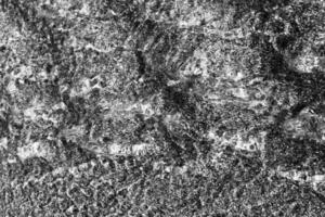 Water motion dynamic texture. Sand on background. Black and white. photo