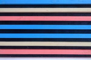Horizontal colored planks background. Multicolor wood planks texture. photo