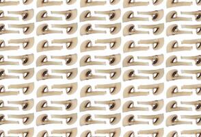 Many champignon slices pattern. Delicious natural texture. Healthy vegetarian background. Portrait poster orientation. Vertical derection. photo