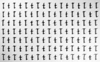 Calligraphy black and white letters T background. Lettering practice writing worksheet. Handwriting symbol filling pattern. Calligraphic letter t learning skills paper page. photo