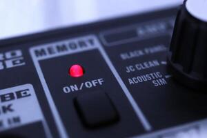 Memory button with light indicator. Musician lifestyle instrument backdrop. Music instruments background. photo