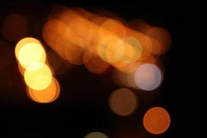 Road light blur. Blurred lights background. photo