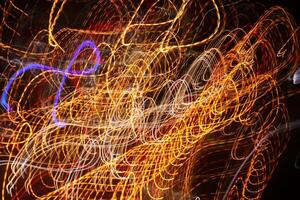 Traffic bright lamps tracks. Road light traces. Trail lines background. photo