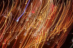 Traffic bright lamps tracks. Road light traces. Trail lines background. photo