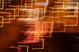 Trail lines background. Traffic bright lamps tracks. Road light traces. photo